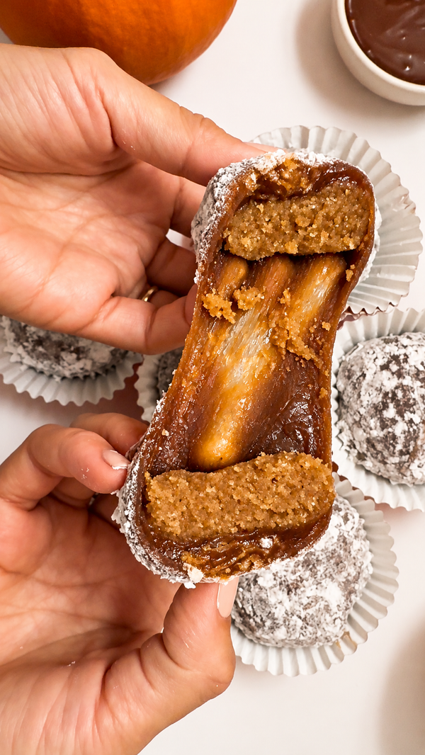 Pumpkin Spice Mookie: gooey mochi pulled apart revealing a soft pumpkin spice cookie dough center