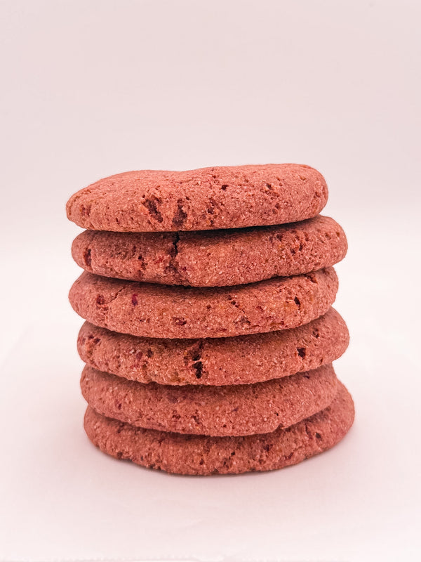 Redhead: thick and chewy gluten-free strawberry cookie in a vertical stack